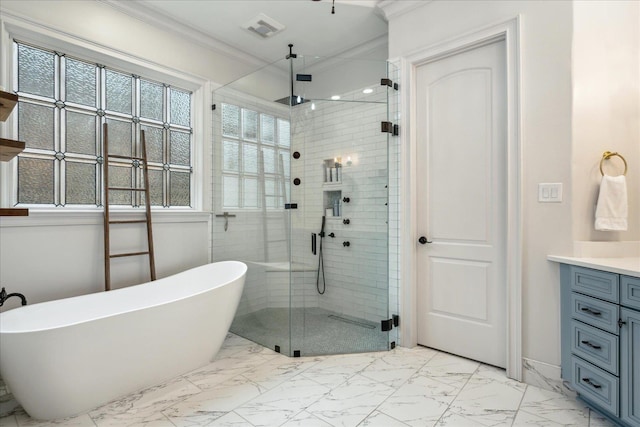 full bathroom featuring visible vents, marble finish floor, ornamental molding, a shower stall, and vanity