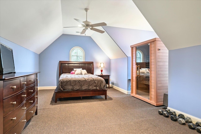 carpeted bedroom featuring vaulted ceiling, a ceiling fan, and baseboards