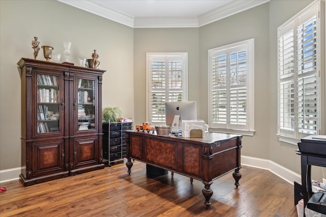 office area with baseboards, wood-type flooring, and ornamental molding