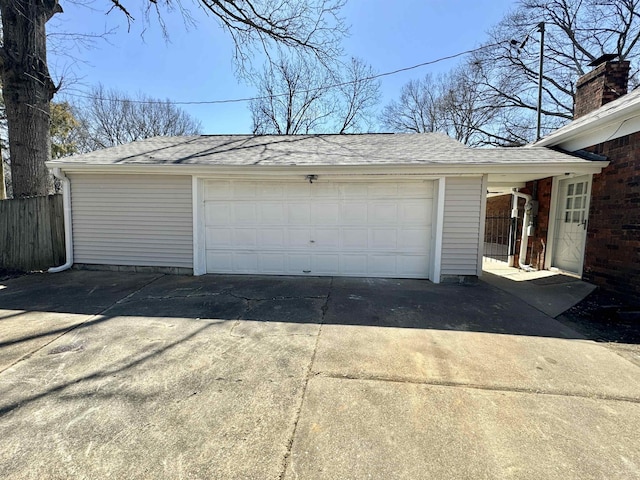 garage featuring fence