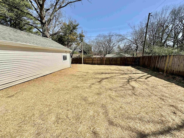 view of yard featuring a fenced backyard