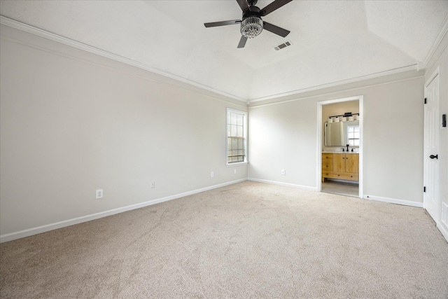 unfurnished bedroom with visible vents, baseboards, carpet, and ornamental molding