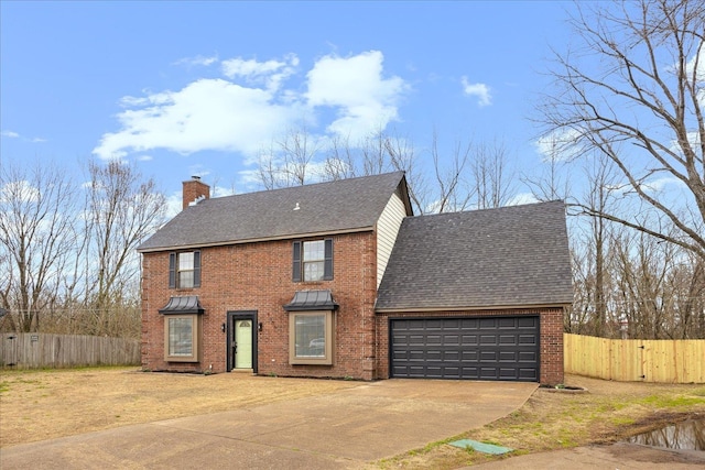 view of front of house with fence, a chimney, concrete driveway, a garage, and brick siding