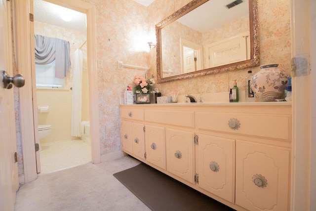 bathroom featuring vanity, visible vents, wallpapered walls, curtained shower, and toilet