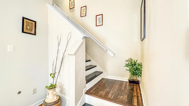 stairway with baseboards