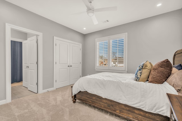 bedroom with a ceiling fan, carpet, baseboards, recessed lighting, and a closet