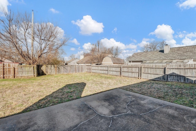 view of yard featuring a fenced backyard and a patio area