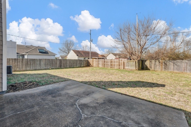 view of yard featuring a patio and a fenced backyard