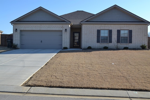 ranch-style house with an attached garage, brick siding, and driveway