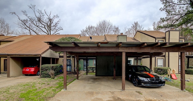 exterior space featuring a carport