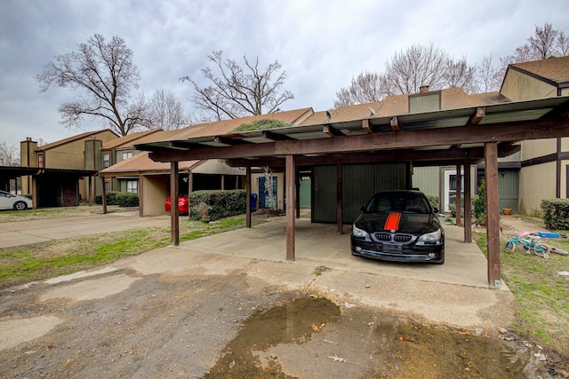 view of car parking with a carport