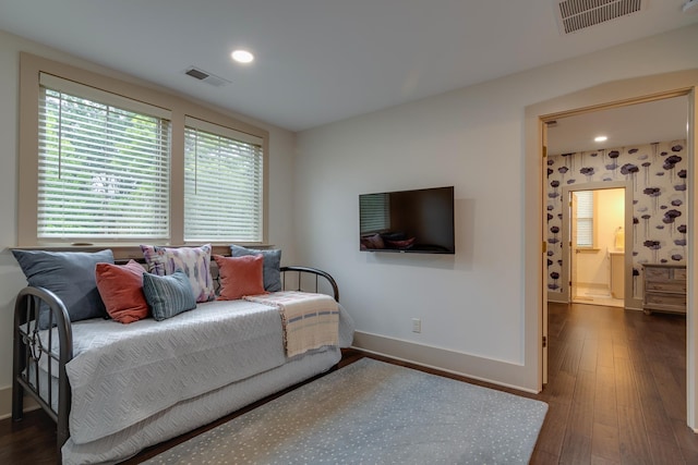 bedroom with recessed lighting, visible vents, baseboards, and dark wood finished floors