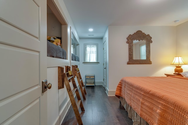 bedroom with recessed lighting, visible vents, baseboards, and dark wood-style flooring