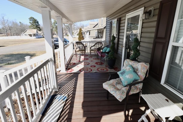 deck featuring covered porch