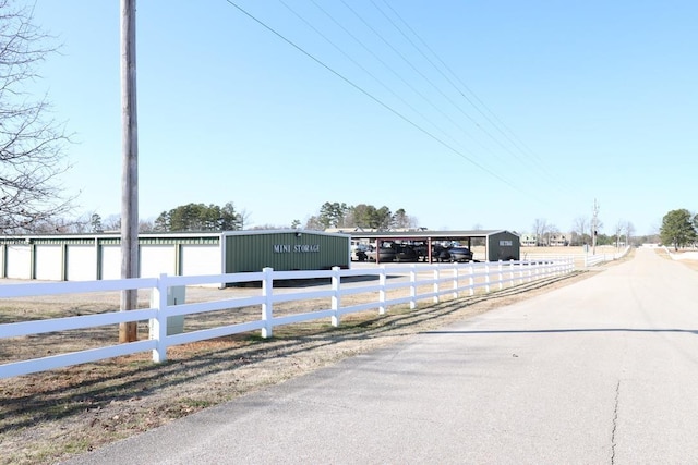 view of street with community garages