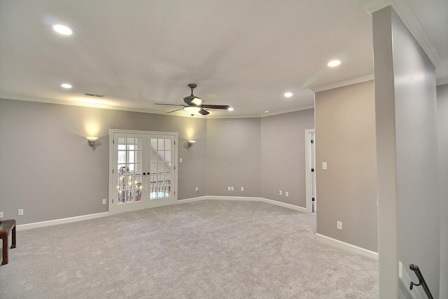 empty room with recessed lighting, french doors, baseboards, and ornamental molding