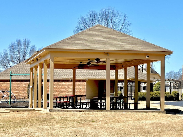 view of community with a gazebo and fence