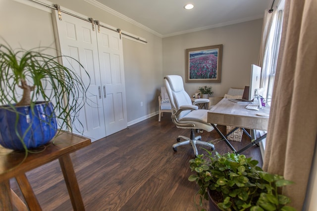 office space with baseboards, dark wood finished floors, recessed lighting, ornamental molding, and a barn door