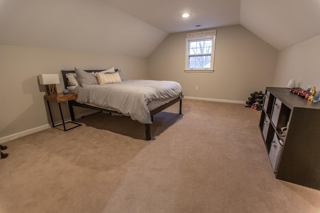 bedroom with recessed lighting, light colored carpet, baseboards, and vaulted ceiling