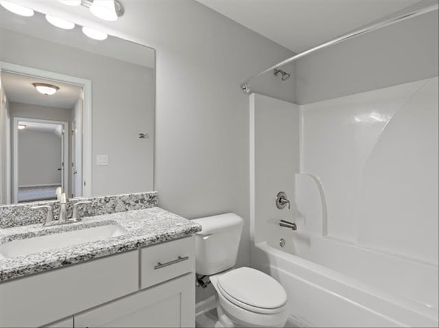 full bath with bathtub / shower combination, toilet, and vanity