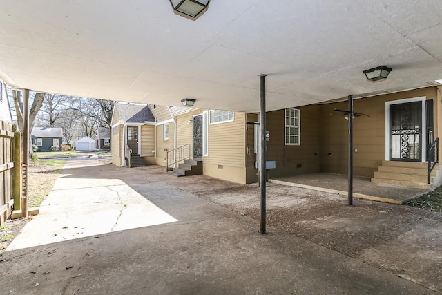 view of patio with entry steps and ceiling fan