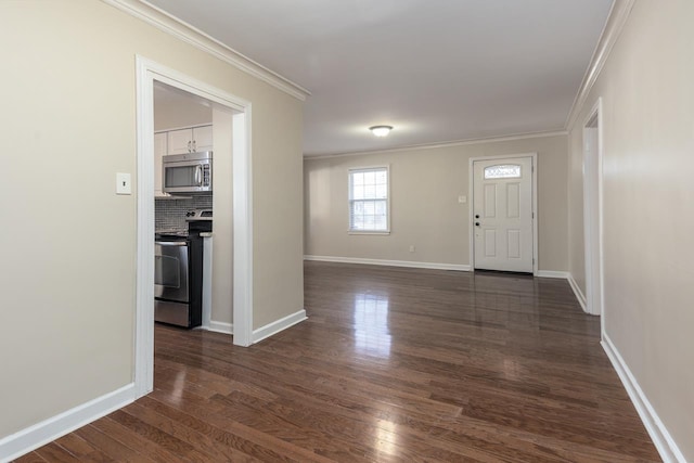 foyer entrance featuring crown molding, baseboards, and dark wood-style flooring