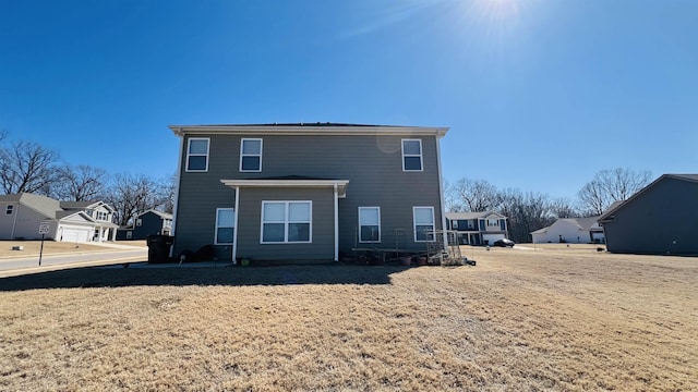 rear view of property with a residential view