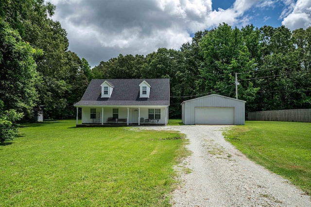 cape cod home featuring a garage, an outbuilding, covered porch, and a front yard