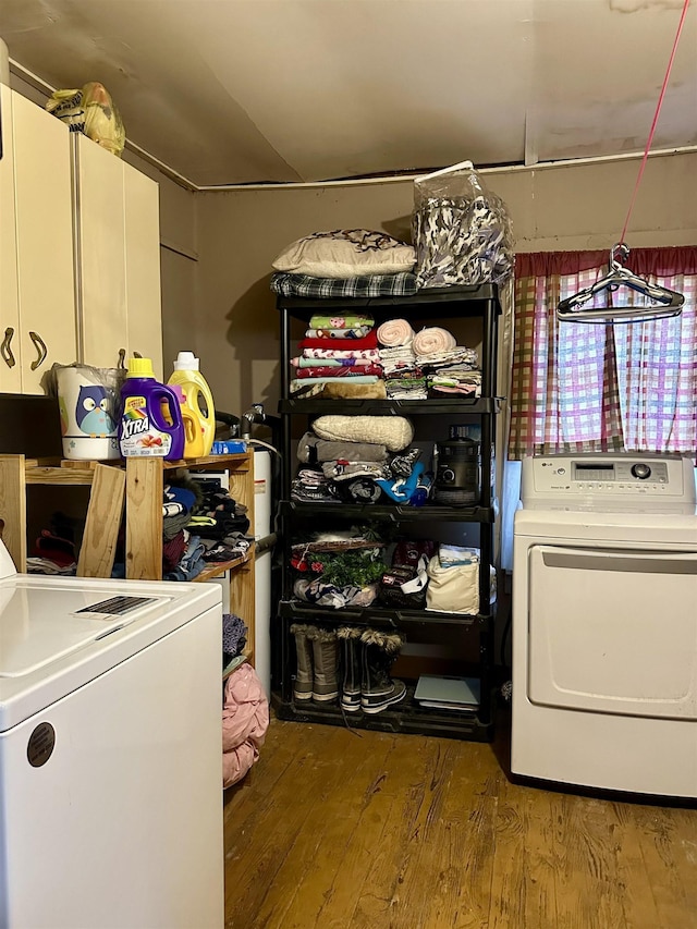 laundry room featuring washer / clothes dryer, wood finished floors, and laundry area