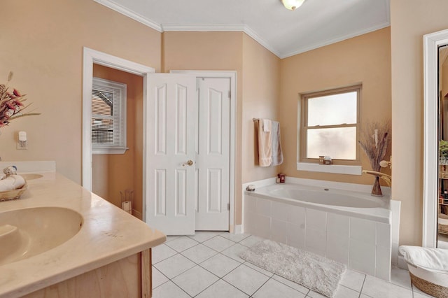 full bathroom featuring a sink, tile patterned floors, a garden tub, and ornamental molding