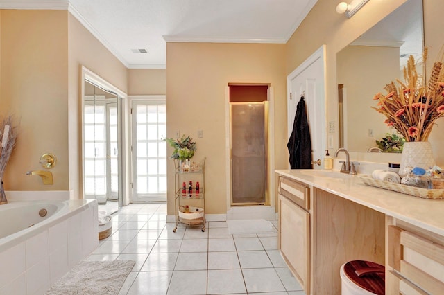 full bathroom featuring visible vents, a garden tub, ornamental molding, a stall shower, and tile patterned floors