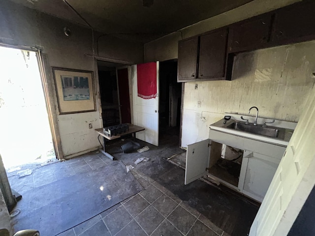 kitchen featuring dark brown cabinets