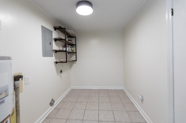 washroom with electric panel, light tile patterned flooring, baseboards, hookup for an electric dryer, and laundry area