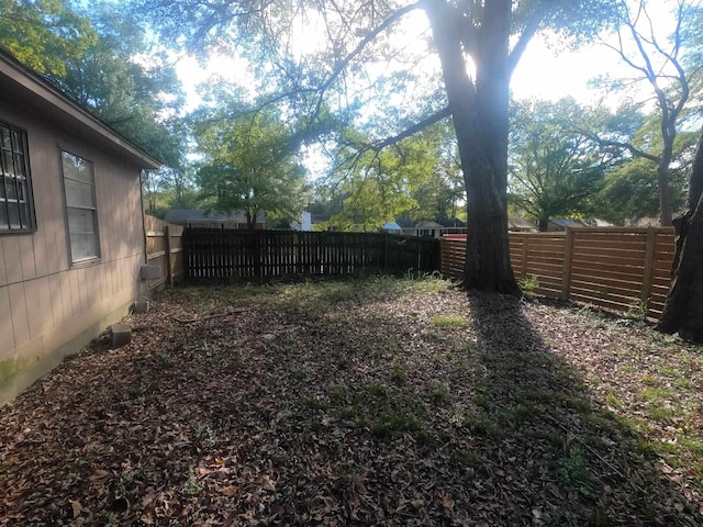 view of yard featuring a fenced backyard