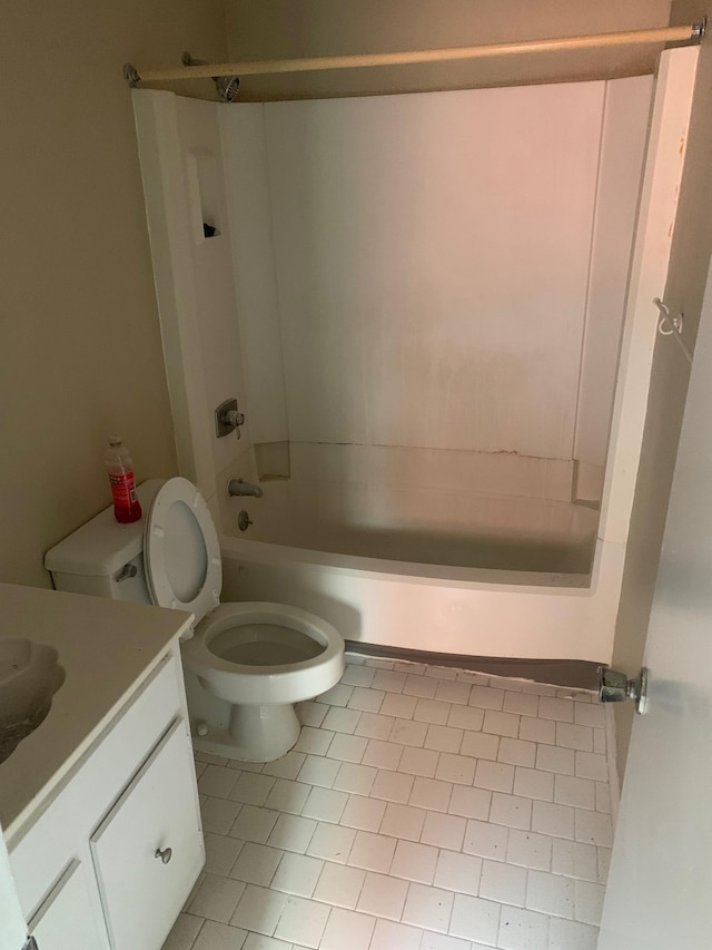 full bath with toilet, vanity, and shower / tub combination