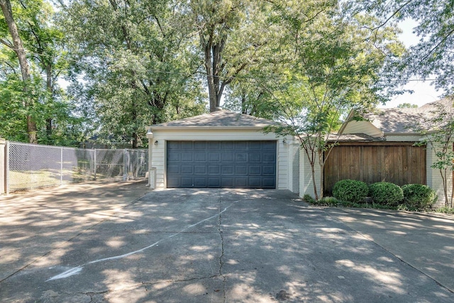 detached garage with fence