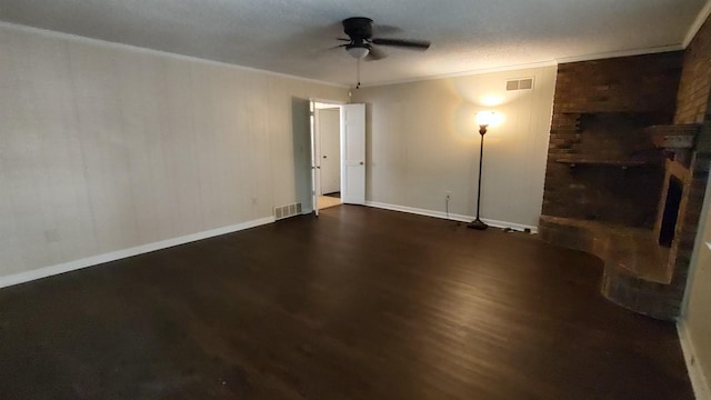 unfurnished living room featuring crown molding, visible vents, dark wood-style flooring, and ceiling fan