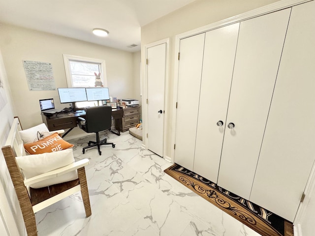 office featuring visible vents and marble finish floor