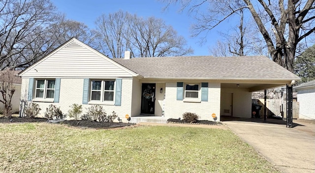 ranch-style house with a carport, a front lawn, driveway, and a chimney