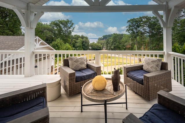 deck featuring outdoor lounge area