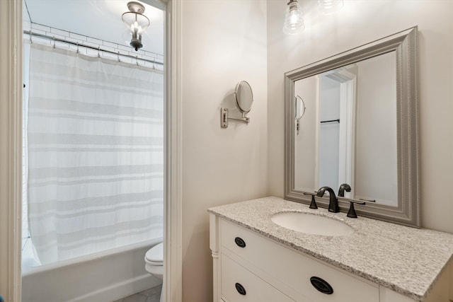 full bath with vanity, toilet, and shower / tub combo with curtain