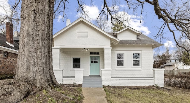 bungalow with brick siding