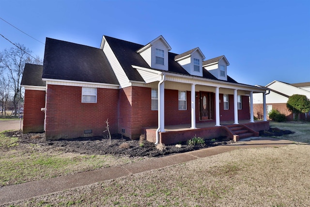 134 Willow Creek Dr, Ripley, TN 38063 - view of front of house featuring a shingled roof, a porch, brick siding, and crawl space