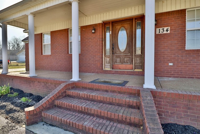 134 Willow Creek Dr, Ripley, TN 38063 - property entrance with brick siding and a porch