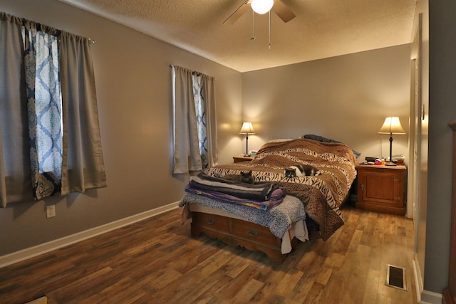 134 Willow Creek Dr, Ripley, TN 38063 - bedroom featuring visible vents, a textured ceiling, wood finished floors, baseboards, and ceiling fan
