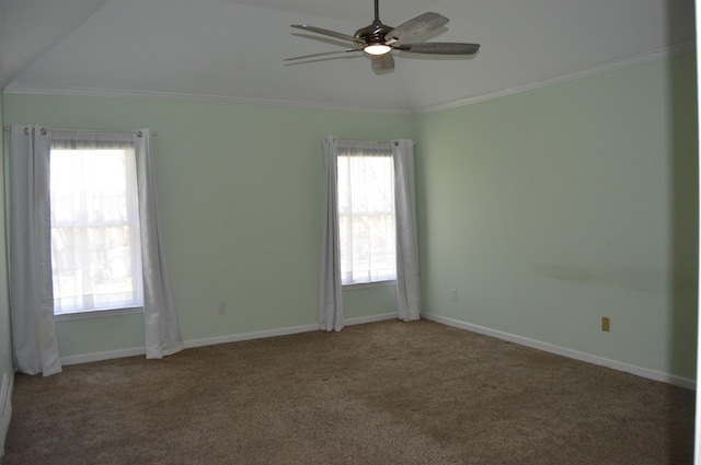 unfurnished room with baseboards, a ceiling fan, ornamental molding, and carpet flooring