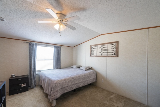 bedroom featuring a textured ceiling, crown molding, light colored carpet, ceiling fan, and vaulted ceiling