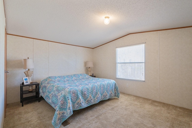 bedroom with vaulted ceiling, ornamental molding, carpet, and a textured ceiling