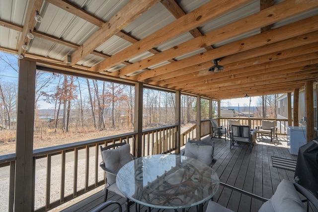 wooden deck with outdoor dining area