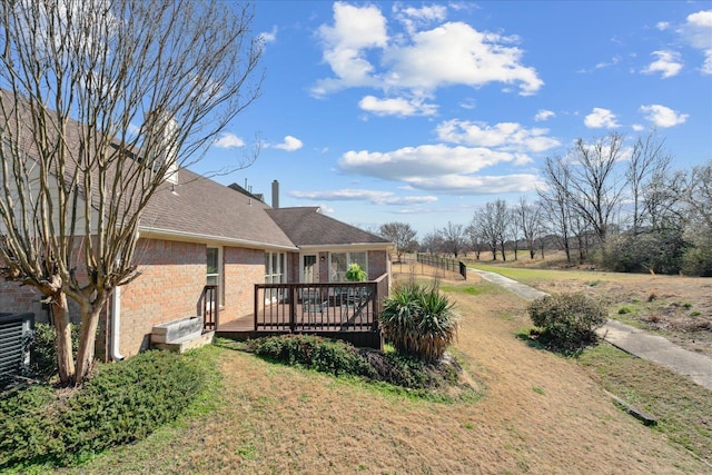 view of yard featuring a deck